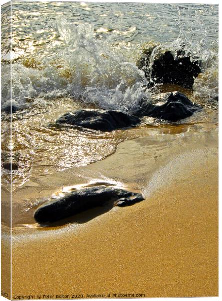 Stones on a beach with the incoming tide lapping around. Cornwall, UK. Canvas Print by Peter Bolton