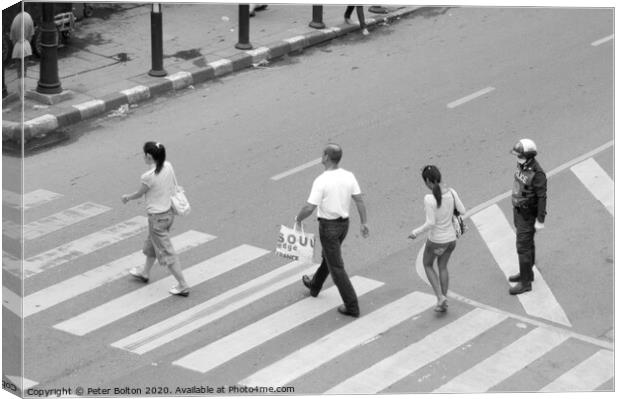 People on a pedestrian crossing in Bangkok. Canvas Print by Peter Bolton