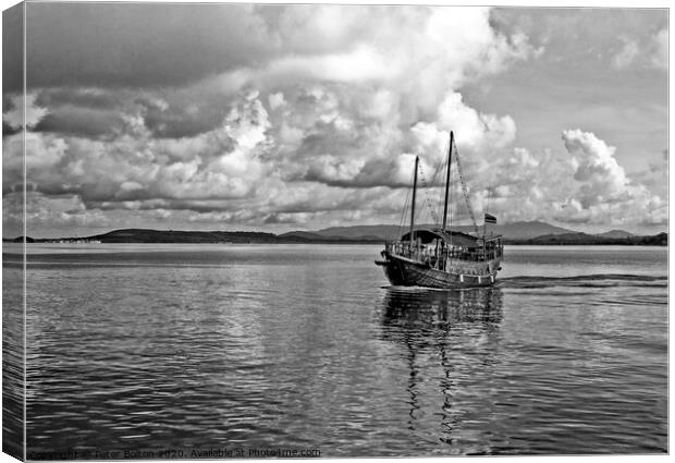 Black and white image of Burmese Junk at Chalong Bay, Thailand. Canvas Print by Peter Bolton