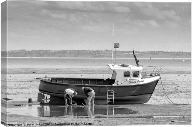 Fishermen maintain their boat at low tide at Thorpe Bay, Essex, UK. Canvas Print by Peter Bolton