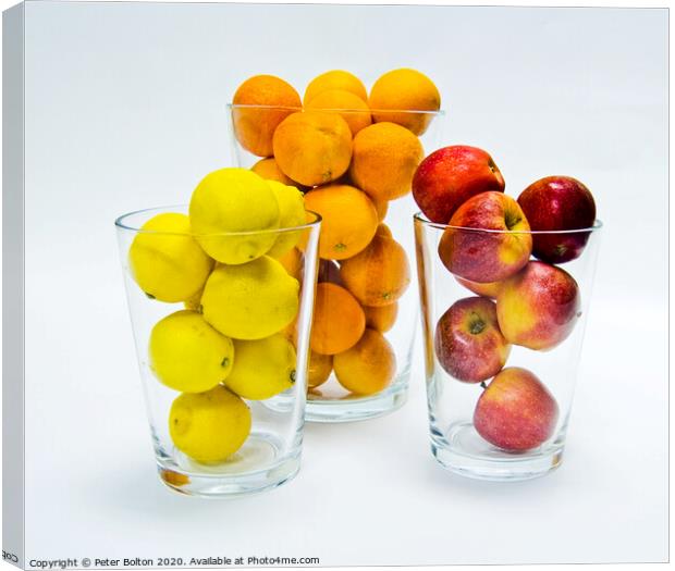 Graphic design of lemons, apples and oranges arranged in glass tumblers. Canvas Print by Peter Bolton