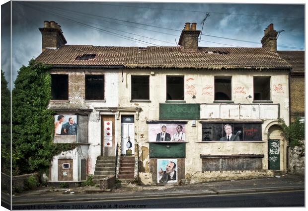 Empty and derelict victorian terrace of houses used as a canvas by local artists at Southend on Sea, Essex, UK. Canvas Print by Peter Bolton