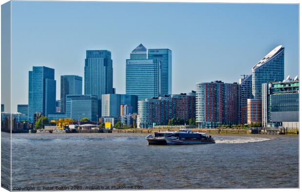 Canary Wharf Business District from the River Thames, London, UK. Canvas Print by Peter Bolton