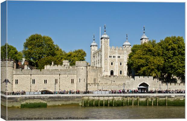 Tower of London from the river Thames, London, UK. Canvas Print by Peter Bolton
