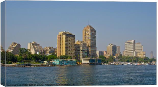 A part of the city skyline from the River Nile, Cairo, Egypt. Canvas Print by Peter Bolton