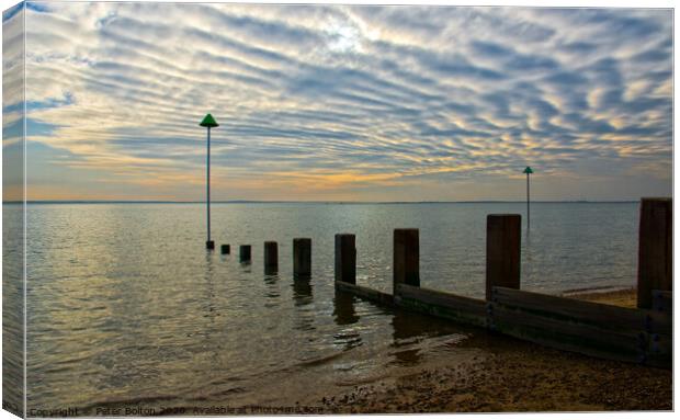 Unusual cloud formations over the Thames Estuary at Westcliff, Essex. Canvas Print by Peter Bolton