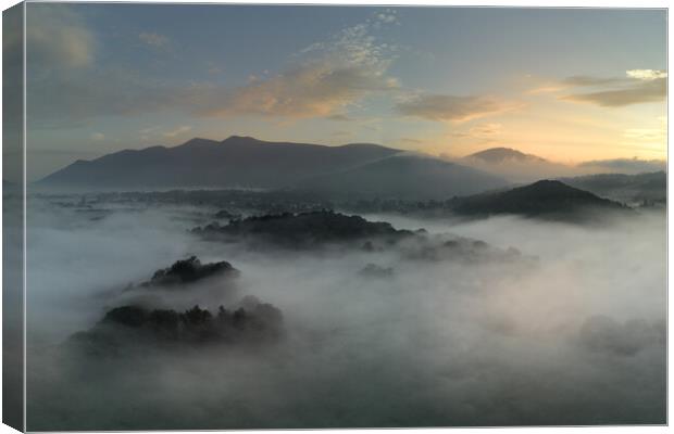 Early Morning Mist Looking Towards Skiddaw and Latrigg Canvas Print by Chester Tugwell