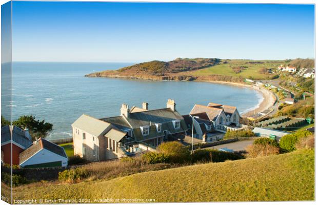 Serene Cove of Langland Bay Canvas Print by Peter Thomas