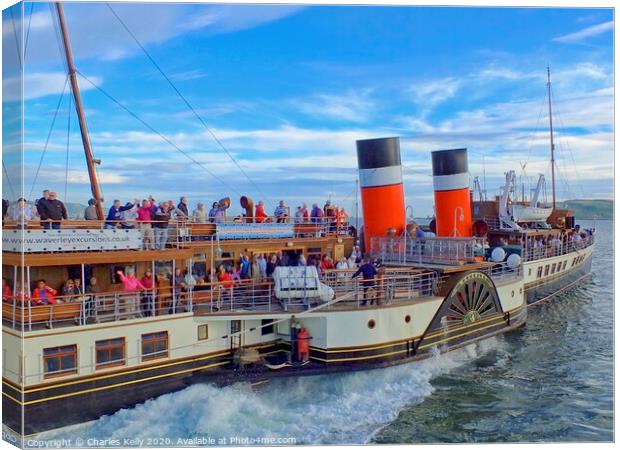The Waverley Paddle Steamer departs Millport Pier Canvas Print by Charles Kelly