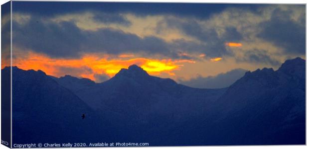 Firey Sunset over the Peaks of Arran Canvas Print by Charles Kelly