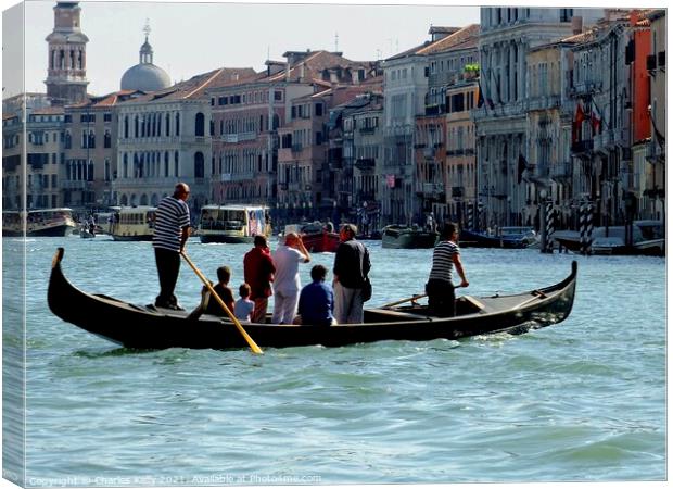 Taking the Gondola taxi across the Grand Canal Canvas Print by Charles Kelly