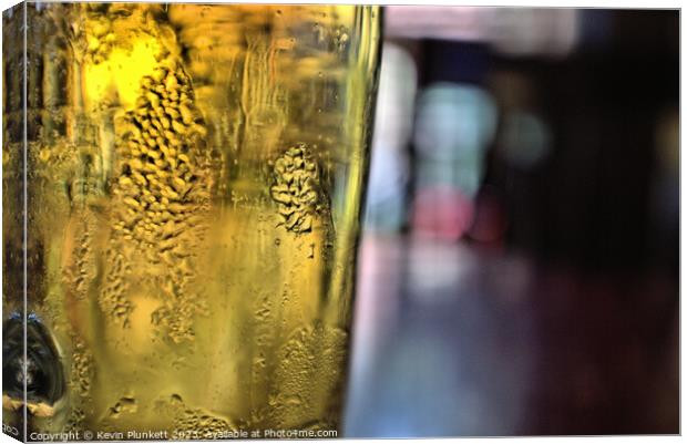 Beer Glass in Saigon ( Ho Chi Minh City ) bar. Canvas Print by Kevin Plunkett