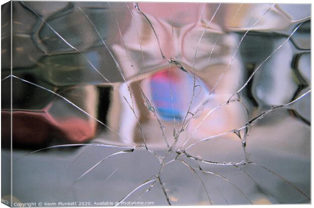Cracked Glass  Canvas Print by Kevin Plunkett