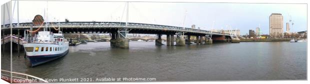 Hungerford Bridge and Golden Jubilee Bridges. River Thames Canvas Print by Kevin Plunkett
