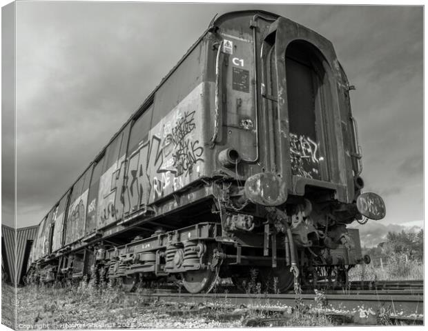 Rusting Abandoned Railway Carriage with Graffiti Canvas Print by Heather Sheldrick