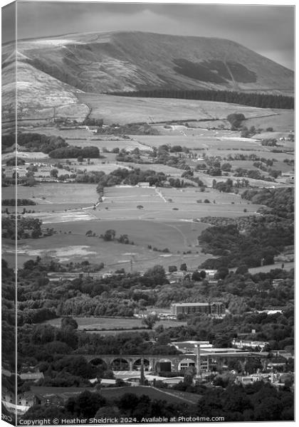 Pendle Hill with Burnley below Canvas Print by Heather Sheldrick