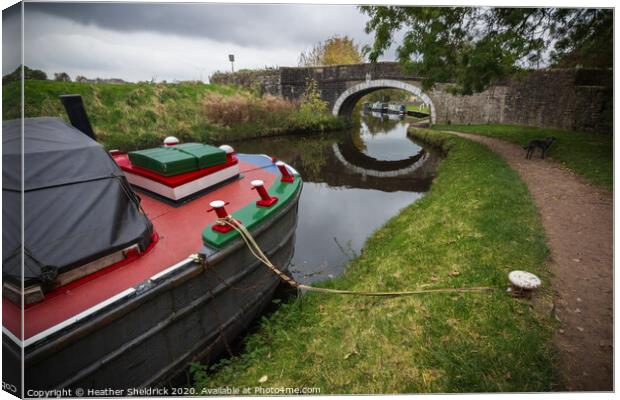 Barge moored on Leeds and Liverpool Canal at Barno Canvas Print by Heather Sheldrick