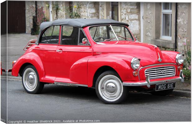 Morris Minor 1000 in Red Canvas Print by Heather Sheldrick