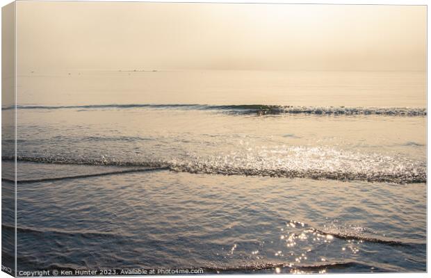 Morning Fog and Lapping Tide  Canvas Print by Ken Hunter