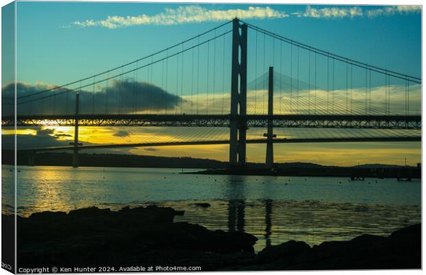 Sunset Behind the Forth Road Bridges Canvas Print by Ken Hunter