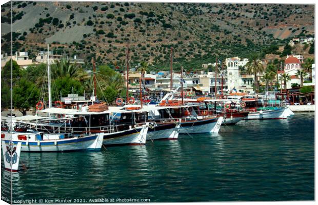 In the Harbor on Crete Canvas Print by Ken Hunter