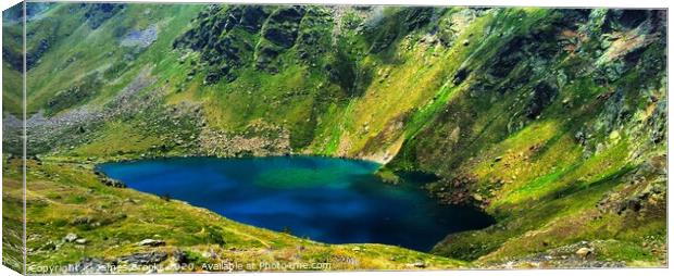 A Lac of Tristaina in Andorra Canvas Print by James Brooks