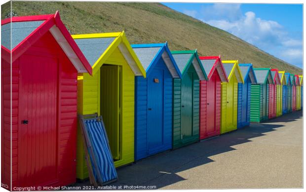 Row of Beach Huts at Whitby Canvas Print by Michael Shannon
