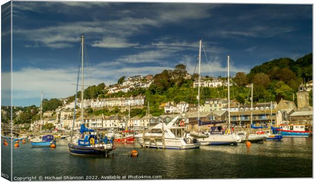 Yachts moored on the river in Looe, Cornwall Canvas Print by Michael Shannon