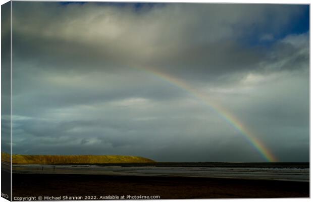Rainbow over Filey beach, North Yorkshire Canvas Print by Michael Shannon
