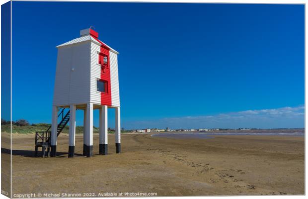 The wooden lighthouse on the beach near Burnham on Canvas Print by Michael Shannon