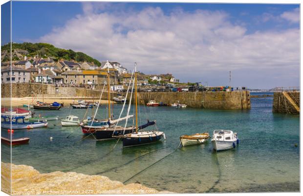 Yachts and small boats moored in Mousehole, Cornwa Canvas Print by Michael Shannon
