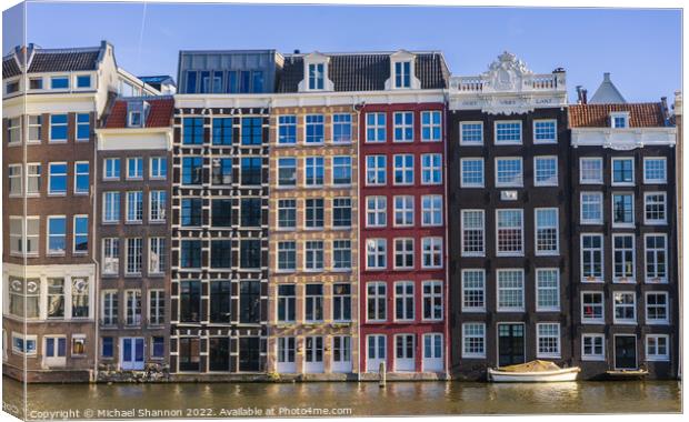 Waterfront buildings in Amsterdam Canvas Print by Michael Shannon