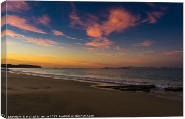 Early morning light at Papagayo beach, Lanzarote. Canvas Print by Michael Shannon