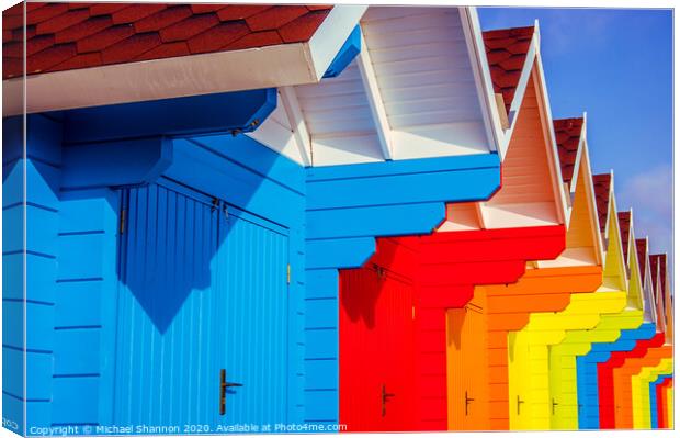 Row of Colourful Beach Huts Canvas Print by Michael Shannon