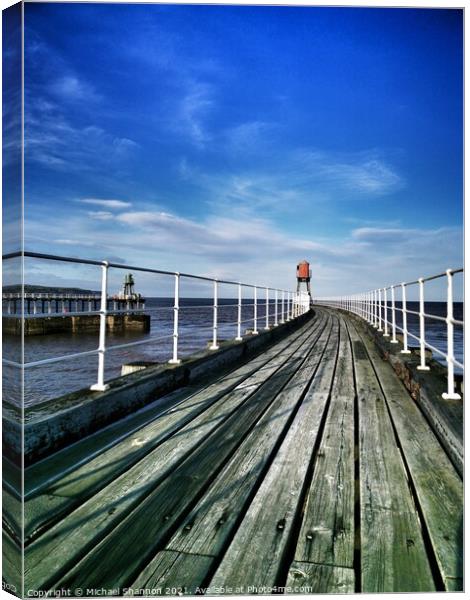 View along the East Pier at Whitby, North Yorkshir Canvas Print by Michael Shannon