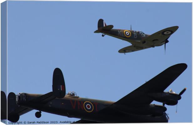 Lancaster Bomber and Spitfire Flyby Canvas Print by Sarah Paddison