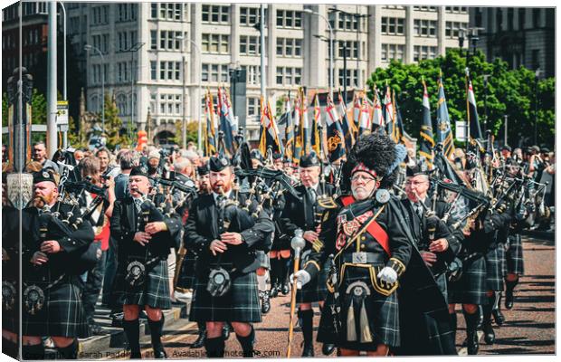 Scottish Pipers during a parade Canvas Print by Sarah Paddison