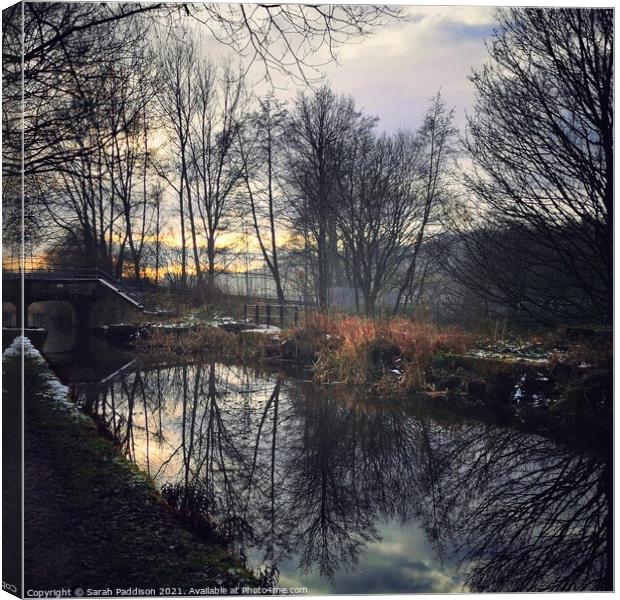Winter Refection in the canal Canvas Print by Sarah Paddison