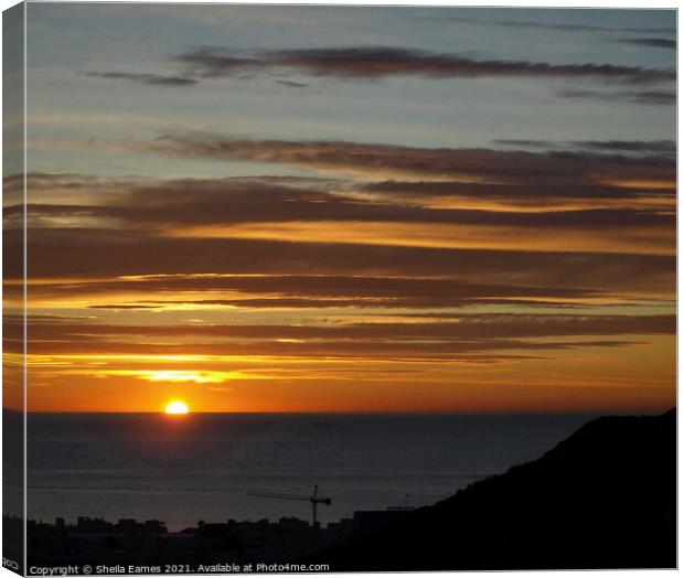 Sunrise over the Sea Canvas Print by Sheila Eames