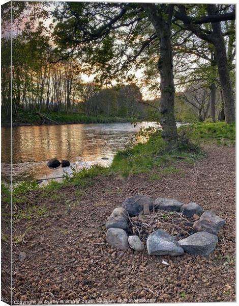 Campfire by the River Canvas Print by Ashley Bremner