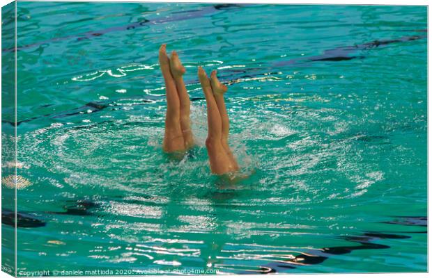 exhibition of synchronized swimming Canvas Print by daniele mattioda