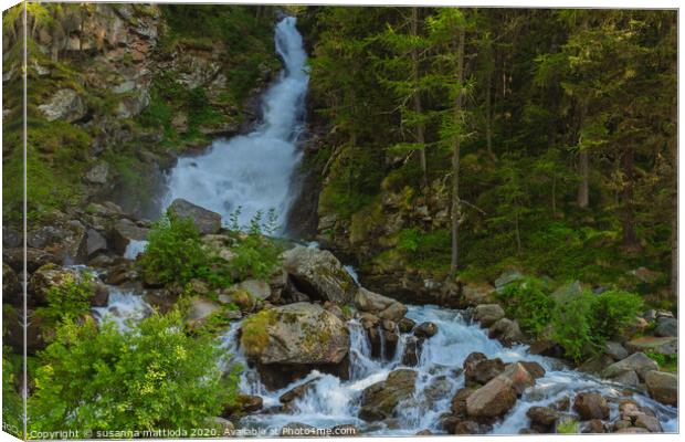 a deafening waterfall falling from glaciers  Canvas Print by susanna mattioda