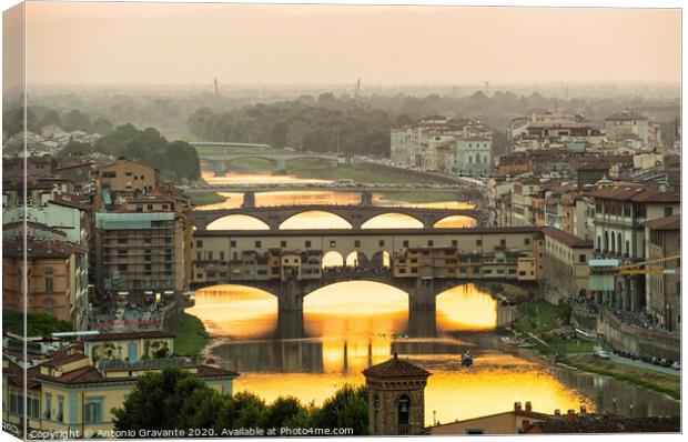  Ponte Vecchio enlighten by the warm sunlight, Florence. Canvas Print by Antonio Gravante