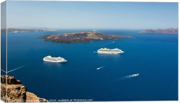 cruise ship near volcano on island of Santorini Canvas Print by Antonio Gravante