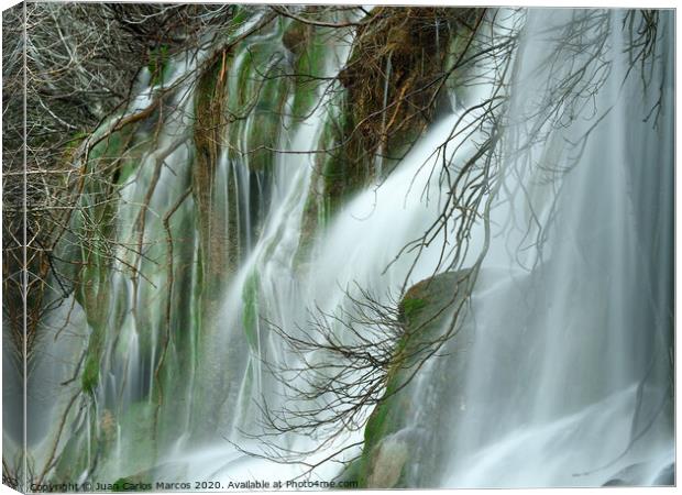 Mantle of water in the Raven waterfall Canvas Print by Juan Carlos Marcos