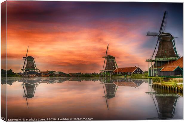 Zaanse Schans Windmills at sunset with reflections. Canvas Print by Marketa Zvelebil