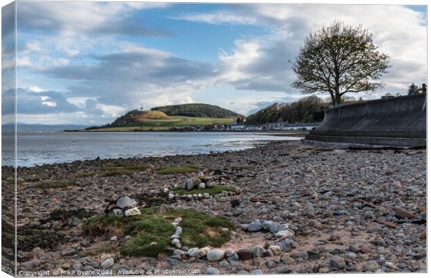A rocky beach on the Black Isle Canvas Print by Mike Byers