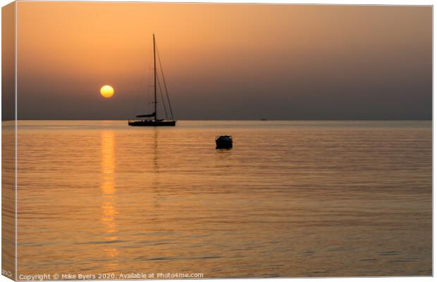 Serene Reflections at Mallorca Sunrise Canvas Print by Mike Byers