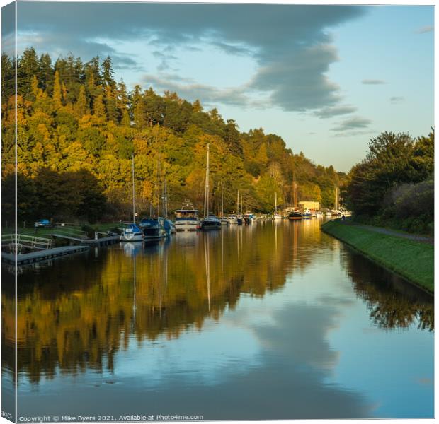 Boats tied up near Loch Ness Canvas Print by Mike Byers