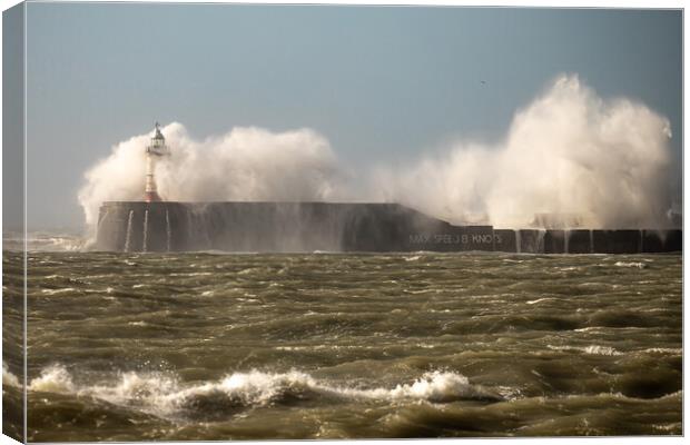 Waves breaking over Newhaven wall Canvas Print by Andy Dow